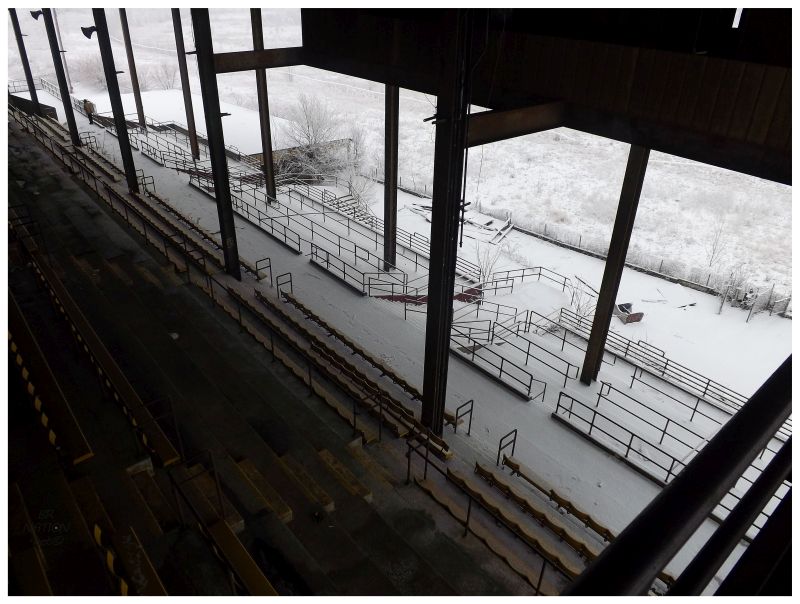 looking down on all of the snow and handrails